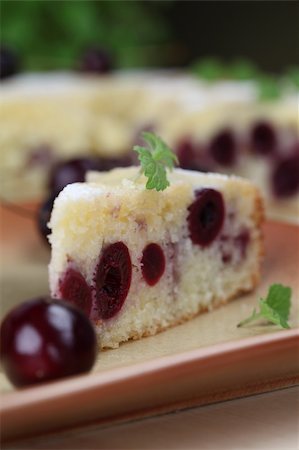 simsearch:400-04380218,k - Delicious homemade sponge cake with black cherries. Shallow DOF Stock Photo - Budget Royalty-Free & Subscription, Code: 400-04711521