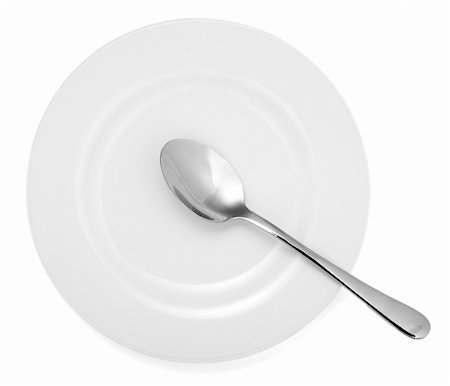 simsearch:400-04755446,k - close up of spoonand plate on white background with clipping path Stock Photo - Budget Royalty-Free & Subscription, Code: 400-04711818