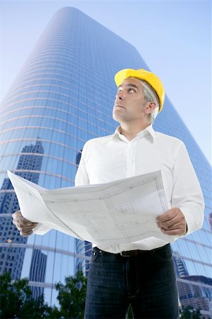 expertise architect senior engineer plan looking up city construction buildings Stock Photo - Budget Royalty-Free & Subscription, Code: 400-04712107