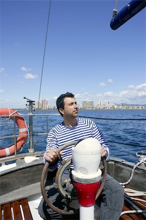 sailor - blue sailor man sailing vintage wooden sailboat mediterranean sea Stock Photo - Budget Royalty-Free & Subscription, Code: 400-04712108