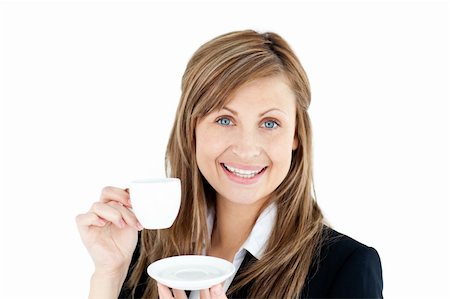 simsearch:400-04188263,k - Merry young businesswoman holding a cup of coffee against white background Foto de stock - Super Valor sin royalties y Suscripción, Código: 400-04712365