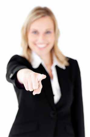 simsearch:400-05242665,k - Bright young businesswoman showing with a finger at the camera against white background Foto de stock - Super Valor sin royalties y Suscripción, Código: 400-04712386