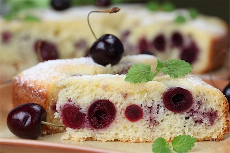 simsearch:400-04380218,k - Delicious homemade sponge cake with black cherries. Shallow DOF Stock Photo - Budget Royalty-Free & Subscription, Code: 400-04712414