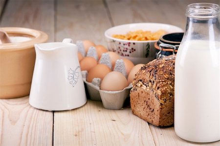 pouring milk and honey - aking food, baking and preparing breakfast, bread and other specials. Studio shots! Stock Photo - Budget Royalty-Free & Subscription, Code: 400-04713158