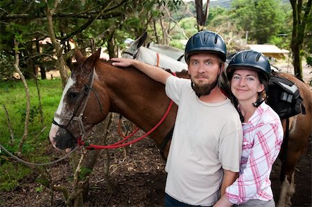 simsearch:400-04729405,k - Equestrian couple posing on a horse ranch in Costa Rica Photographie de stock - Aubaine LD & Abonnement, Code: 400-04713239