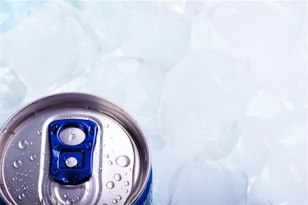 simsearch:400-05249077,k - Energy drink can on blue background Stock Photo - Budget Royalty-Free & Subscription, Code: 400-04713265