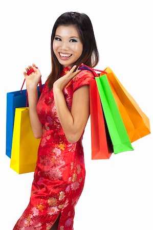 Woman in tradition Cheongsam holding colorful shopping bag. Stock Photo - Budget Royalty-Free & Subscription, Code: 400-04713581