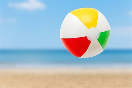 simsearch:400-04766687,k - Colorful ball on a sandy beach Foto de stock - Super Valor sin royalties y Suscripción, Código: 400-04724197