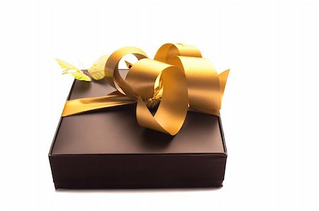 simsearch:400-07107254,k - gift with gold ribbon Photographie de stock - Aubaine LD & Abonnement, Code: 400-04724215