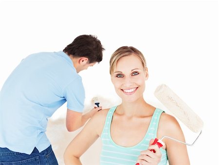 simsearch:400-04878558,k - Bright caucasian couple painting a room in their new house Stock Photo - Budget Royalty-Free & Subscription, Code: 400-04724767