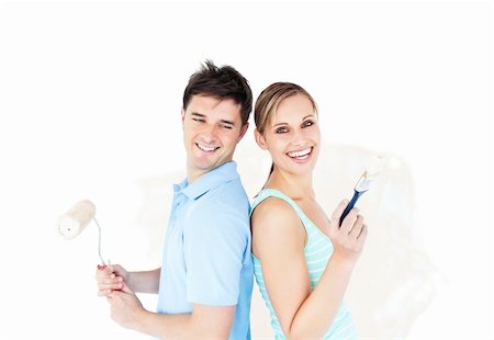 simsearch:400-04878558,k - Bright young couple painting a room in their new house Stock Photo - Budget Royalty-Free & Subscription, Code: 400-04724775