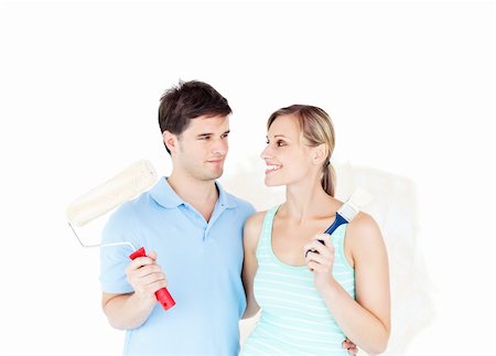 simsearch:400-04878558,k - Lovely young couple painting a room in their new house Stock Photo - Budget Royalty-Free & Subscription, Code: 400-04724776