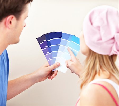 simsearch:400-04878558,k - Concentrated couple choosing color for a room in their new house Stock Photo - Budget Royalty-Free & Subscription, Code: 400-04724791