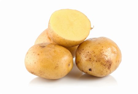 simsearch:400-04812261,k - Four potatoes isolated on a white background Photographie de stock - Aubaine LD & Abonnement, Code: 400-04725957