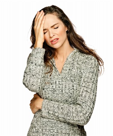 simsearch:400-04978521,k - A young attractive woman suffering from illness or headache holding her head. Isolateed on white. Stock Photo - Budget Royalty-Free & Subscription, Code: 400-04726675