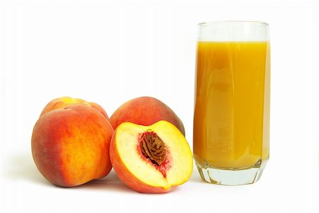 Glass with freshly made peach juice on a white background Photographie de stock - Aubaine LD & Abonnement, Code: 400-04727645