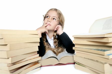 simsearch:400-08429355,k - little thinking student blond braided girl with glasses smiling stacked books on white background Photographie de stock - Aubaine LD & Abonnement, Code: 400-04727865