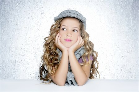 simsearch:400-05248187,k - winter cap wool scarf little fashion girl portrait silver gray background Photographie de stock - Aubaine LD & Abonnement, Code: 400-04727870