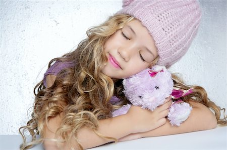 small little girl pic to hug a teddy - winter fashion cap little girl hug teddy bear smiling silver background Stock Photo - Budget Royalty-Free & Subscription, Code: 400-04727872