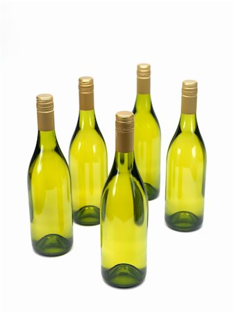 Bottles of white wine isolated against a white background Stock Photo - Budget Royalty-Free & Subscription, Code: 400-04728168