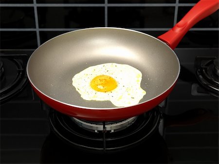 simsearch:400-04139196,k - A freshly fried egg in a frying pan Foto de stock - Royalty-Free Super Valor e Assinatura, Número: 400-04728163