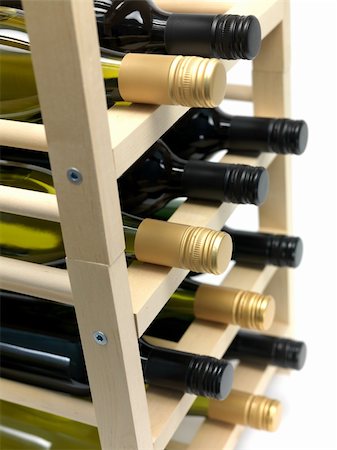 Bottled wine and a wine rack isolated against a white background Stock Photo - Budget Royalty-Free & Subscription, Code: 400-04728170