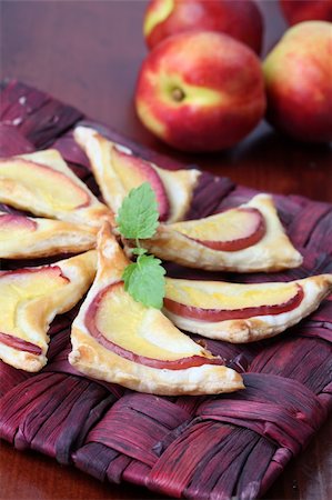 simsearch:400-04822787,k - Delicious puff pastry triangles with fresh nectarines Stock Photo - Budget Royalty-Free & Subscription, Code: 400-04728358