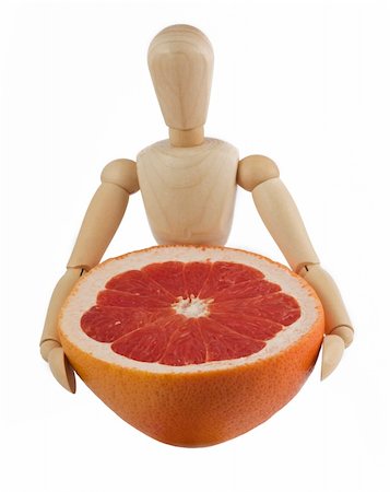 Wooden mannequin with a half of grapefruit isolated on white Stock Photo - Budget Royalty-Free & Subscription, Code: 400-04728771