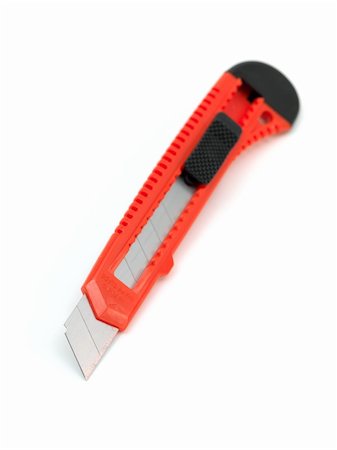 stanley knife - A box cutter isolated against a white background Stock Photo - Budget Royalty-Free & Subscription, Code: 400-04728942