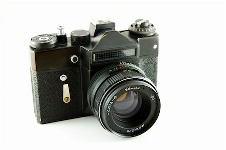 An analog camera isolated on white background Fotografie stock - Microstock e Abbonamento, Codice: 400-04729187