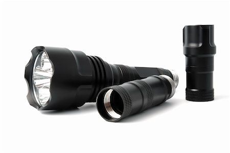 simsearch:400-08187651,k - A black metal coated flashlight isolated on white Fotografie stock - Microstock e Abbonamento, Codice: 400-04729519