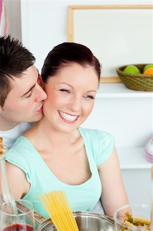 Caucasian couple preparing spaghetti in the kitchen at home Stock Photo - Budget Royalty-Free & Subscription, Code: 400-04720001