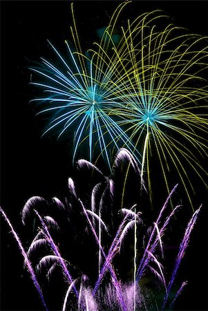 simsearch:400-07093371,k - Firework streaks in the night sky during celebrations. Fotografie stock - Microstock e Abbonamento, Codice: 400-04720128