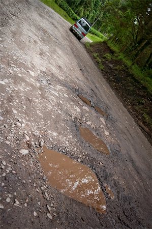 simsearch:400-04729403,k - Famous Costa Rica potholes on rugged dirt road Photographie de stock - Aubaine LD & Abonnement, Code: 400-04720844