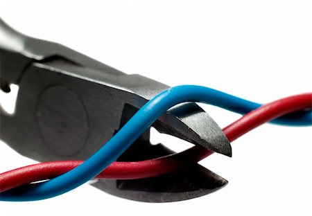 Metal nippers is cutting red wire and leaving blue Stockbilder - Microstock & Abonnement, Bildnummer: 400-04720934