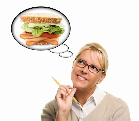 dreaming about eating - Hungry Woman with Thought Bubbles of Big, Fresh Sandwich Isolated on a White Background. Foto de stock - Super Valor sin royalties y Suscripción, Código: 400-04721714