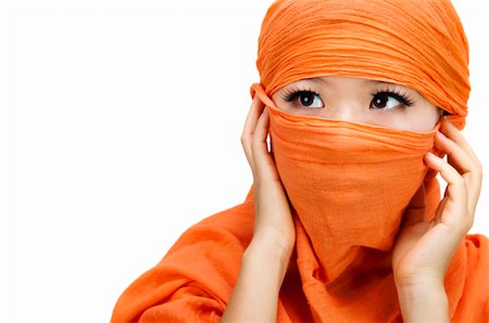 face covered with scarf - Close up picture of a Muslim woman wearing a veil Stock Photo - Budget Royalty-Free & Subscription, Code: 400-04721995
