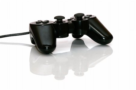 Gamepad isolated on white background with reflection. Stock Photo - Budget Royalty-Free & Subscription, Code: 400-04722294