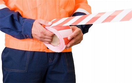 simsearch:400-08187897,k - Worker stretch warning tape isolated on white Stock Photo - Budget Royalty-Free & Subscription, Code: 400-04723432