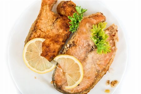 simsearch:400-05381790,k - Tasty red fish dish isolated on a white background Foto de stock - Super Valor sin royalties y Suscripción, Código: 400-04723474