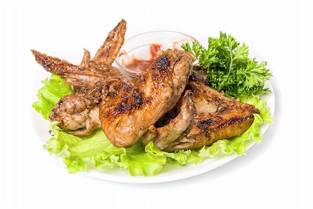 simsearch:400-07170188,k - Tasty grilled chicken wings with vegetables and sauce Stockbilder - Microstock & Abonnement, Bildnummer: 400-04723485