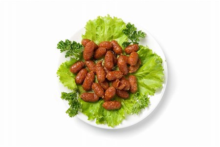 pig roast - grilled sausages on green lettuce with isolated on white Stock Photo - Budget Royalty-Free & Subscription, Code: 400-04723491