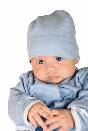 simsearch:400-04737497,k - Lying baby boy at blue on a white background Stockbilder - Microstock & Abonnement, Bildnummer: 400-04723516