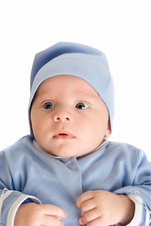 simsearch:400-04737497,k - Lying baby boy at blue on a white background Stockbilder - Microstock & Abonnement, Bildnummer: 400-04723518