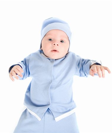 simsearch:400-04737497,k - Lying baby boy at blue on a white background Stockbilder - Microstock & Abonnement, Bildnummer: 400-04723520