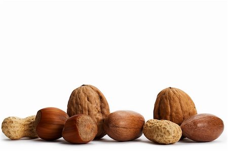 peanut object - two of each pecan hazelnuts walnuts and peanuts on white background Stock Photo - Budget Royalty-Free & Subscription, Code: 400-04723977