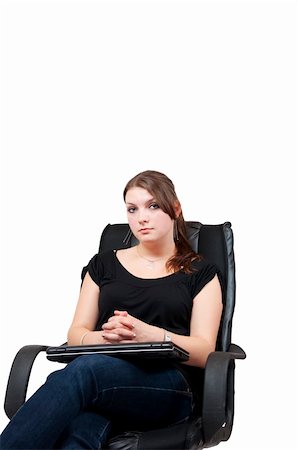 female sit ups black background - Young woman sitting in chair with a close laptop, isolated on white background Stock Photo - Budget Royalty-Free & Subscription, Code: 400-04734099