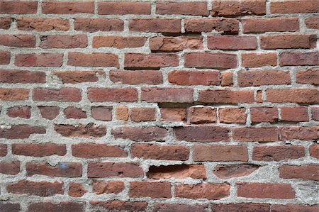 simsearch:400-04264961,k - Old brick wall with several partially missing horizontal Stock Photo - Budget Royalty-Free & Subscription, Code: 400-04734092