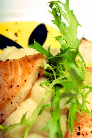 potato salad yellow - Hot fish dish with sauce Stock Photo - Budget Royalty-Free & Subscription, Code: 400-04734274
