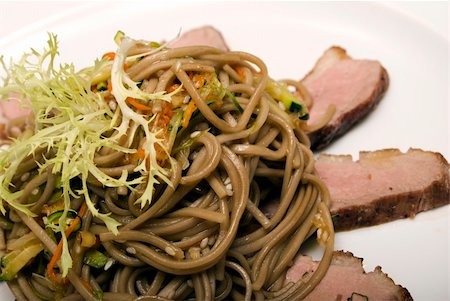 simsearch:400-05259212,k - Spaghetti served with meat and ruccola Stock Photo - Budget Royalty-Free & Subscription, Code: 400-04734279